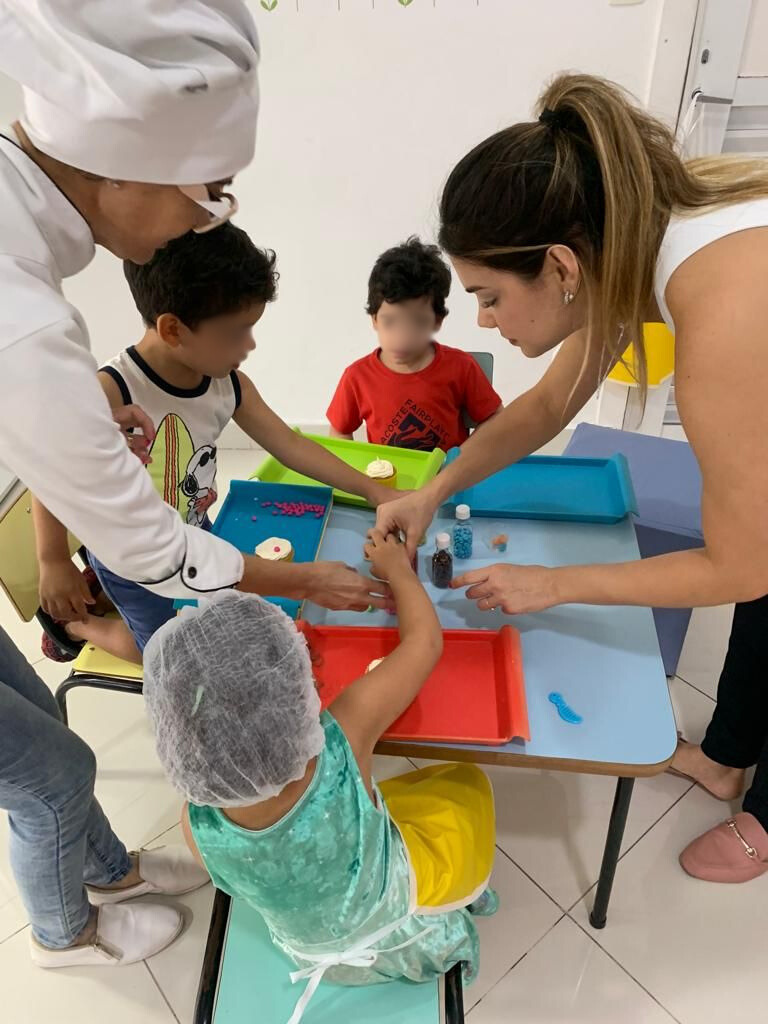 Little children in art class with teacher