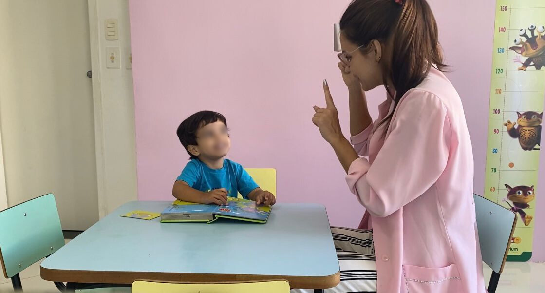 Boy on therapy swing